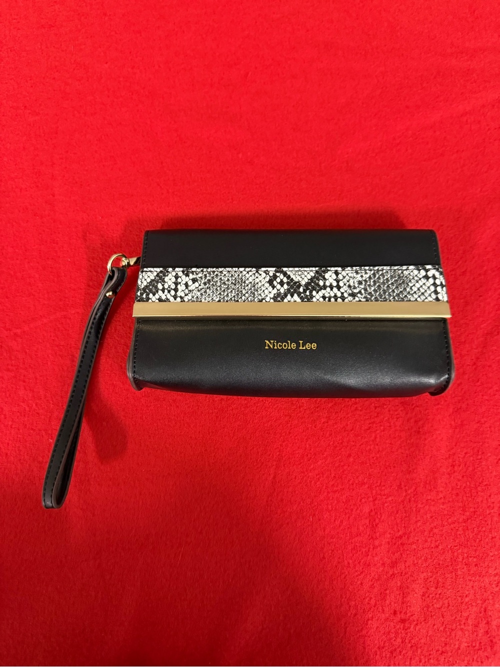 Nicole Lee Black Wristlet Clutch with Snakeskin Trim and Gold Accent
